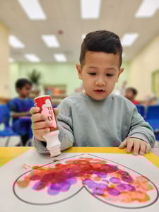 A boy in Palo Alto, learning STEM and Montessori at a 'job'