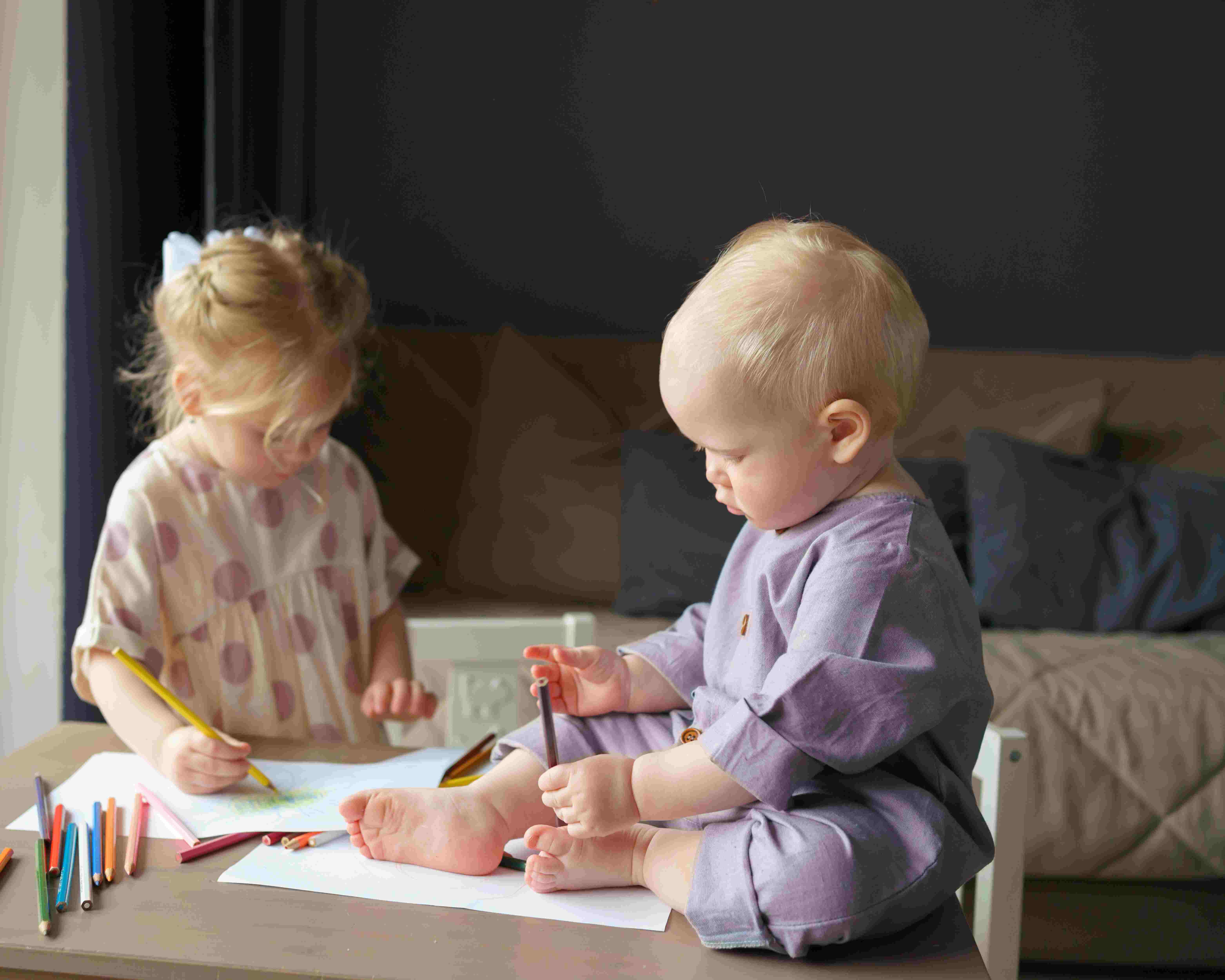 toddlers practicing writing 