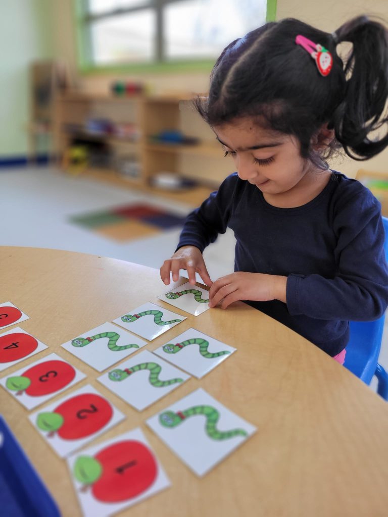 Child doing a Montessori 'job' in Hercules, California
