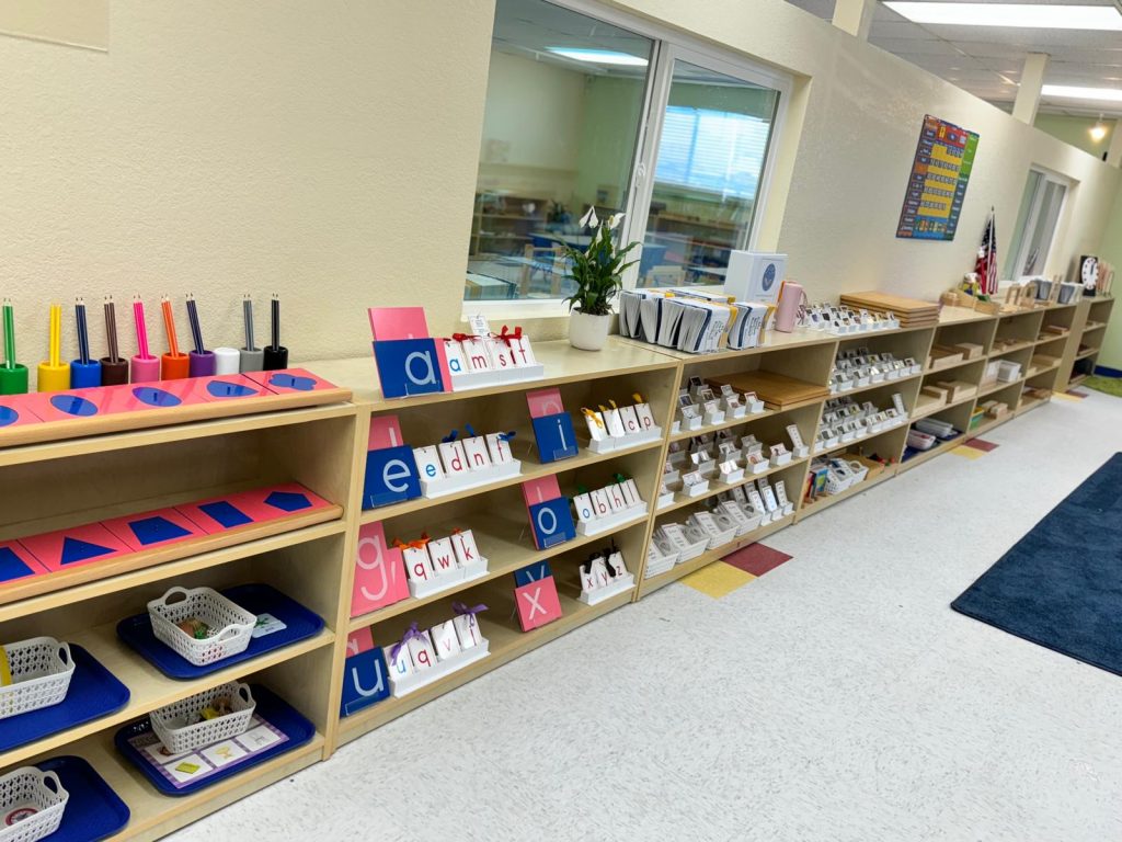 Hercules, California preschool program - photo of our bookshelves full of 'jobs' as part of the Montessori method.