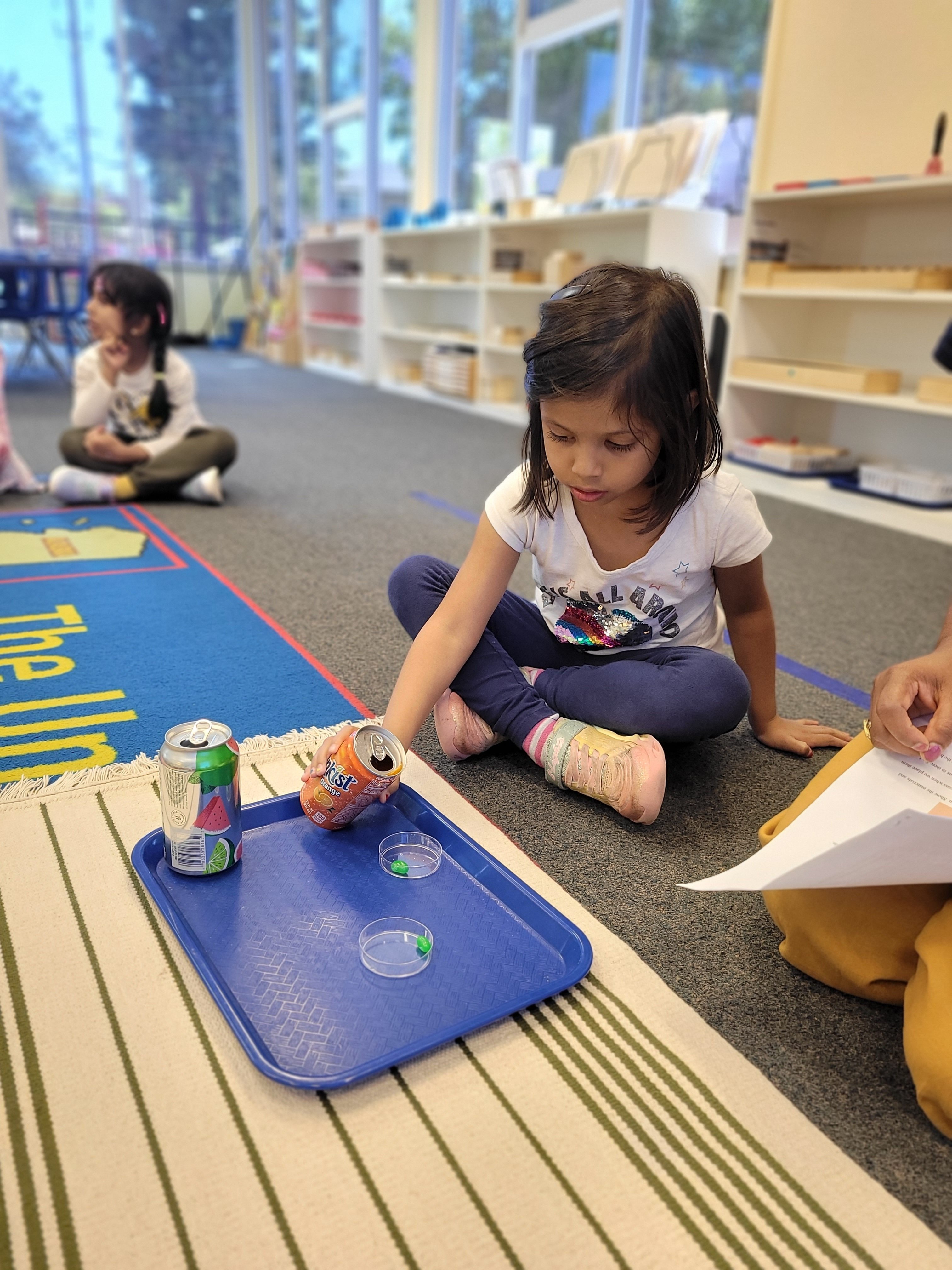 Sunnyvale, California preschool program - girl working on a 'Montessori job' as part of this top-rated program