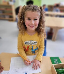 A child using the Montessori method in a preschool in Moraga, California