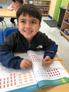 The Montessori method at work in Fremont, California, as a child learns to read.