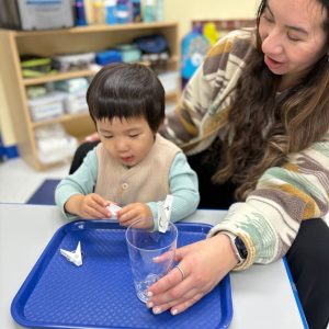 Teacher teaching the Montessori way